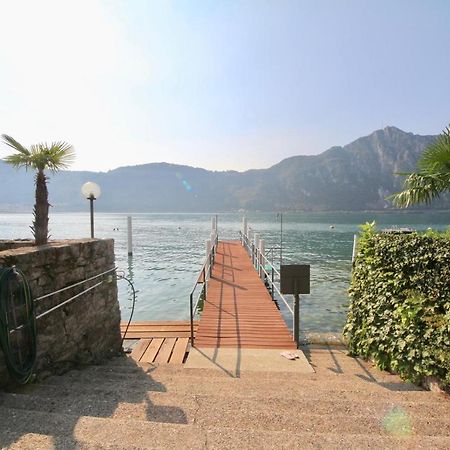 Luganersee, Pool, Strand, Parkplatz, Suite Bissone Bagian luar foto